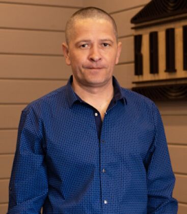 Алексей Комин